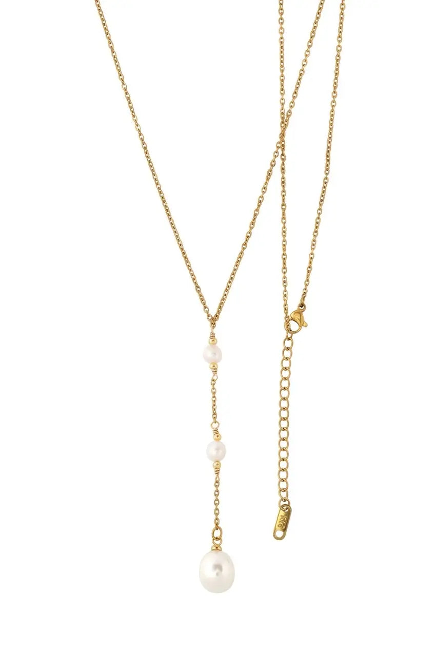 A gold-tone double-layer necklace featuring a delicate chain and a longer lariat-style drop chain with small white pearl beads and a larger hanging pearl pendant, shown on a plain white background.