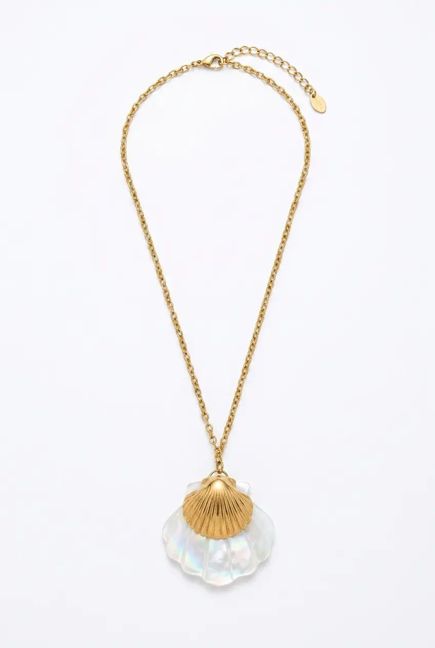 A gold chain necklace featuring a seashell pendant with a textured gold top half and a translucent iridescent white bottom half, displayed on a clean white background.