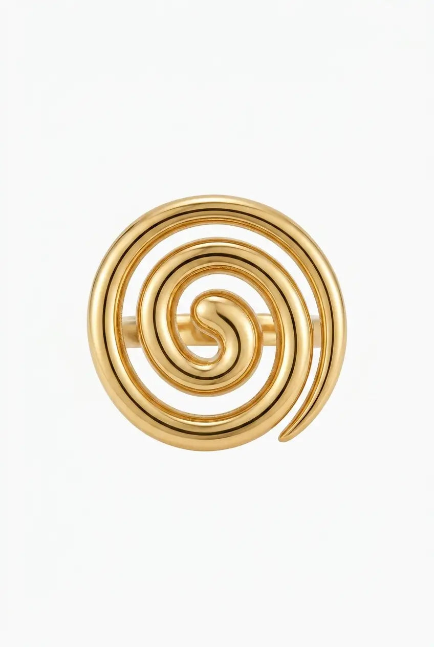 A gold spiral ring with a polished finish, photographed against a clean white background.