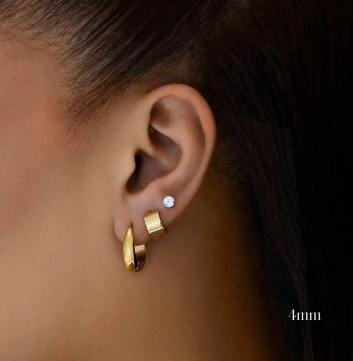 Crystal zircon stud earrings 4mm worn on ear — YUBAMA waterproof zircon stud earrings
