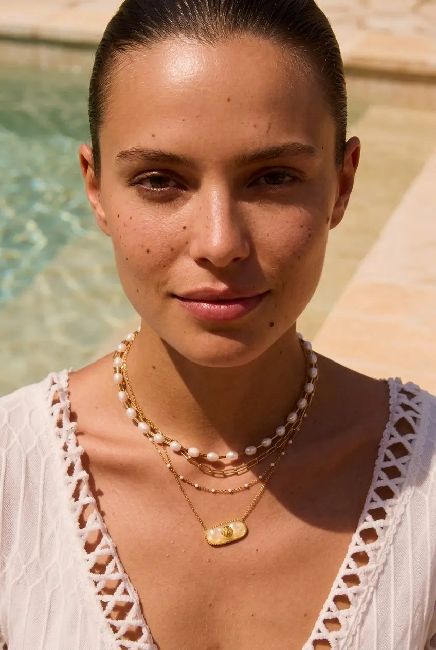 Oval shell pendant necklace pool resort lifestyle — YUBAMA waterproof gold shell necklace