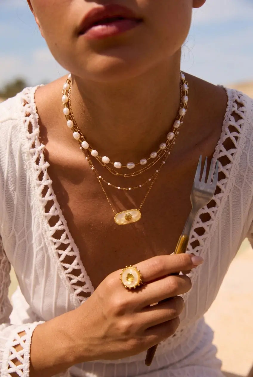 Oval shell pendant necklace worn layered — YUBAMA waterproof gold pendant necklace