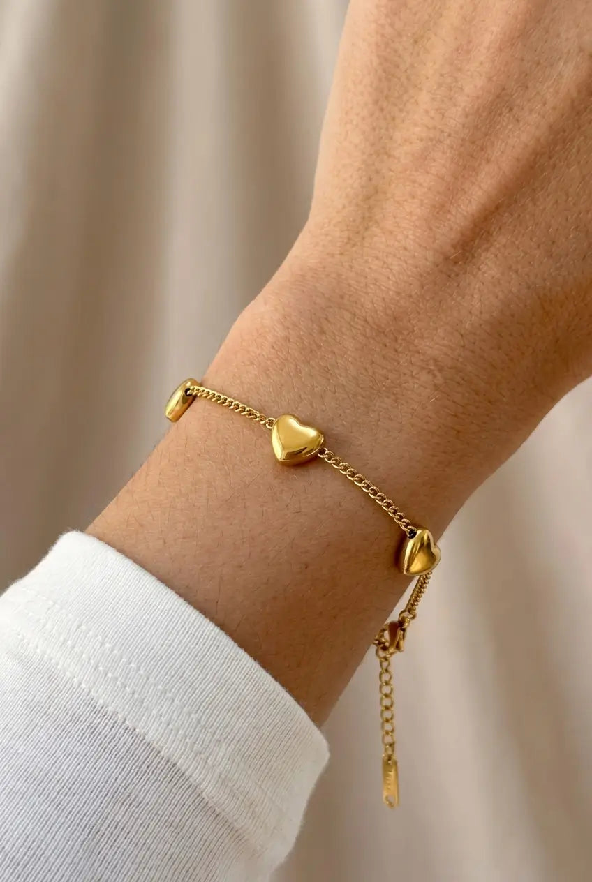 Puffy heart station bracelet worn on wrist — YUBAMA 18K gold PVD waterproof bracelet