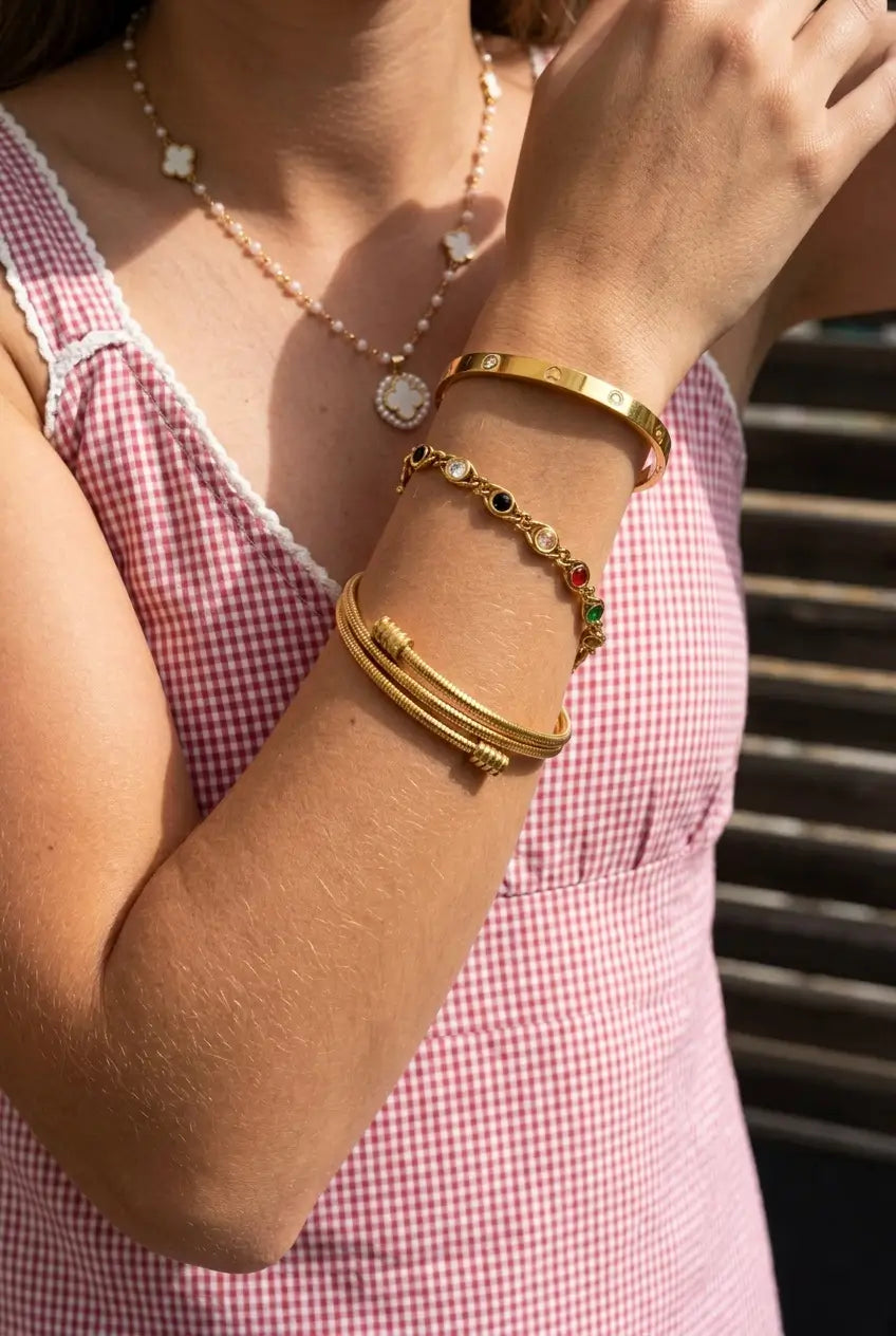 Rainbow crystal chain bracelet stacked on wrist — YUBAMA waterproof gold crystal bracelet