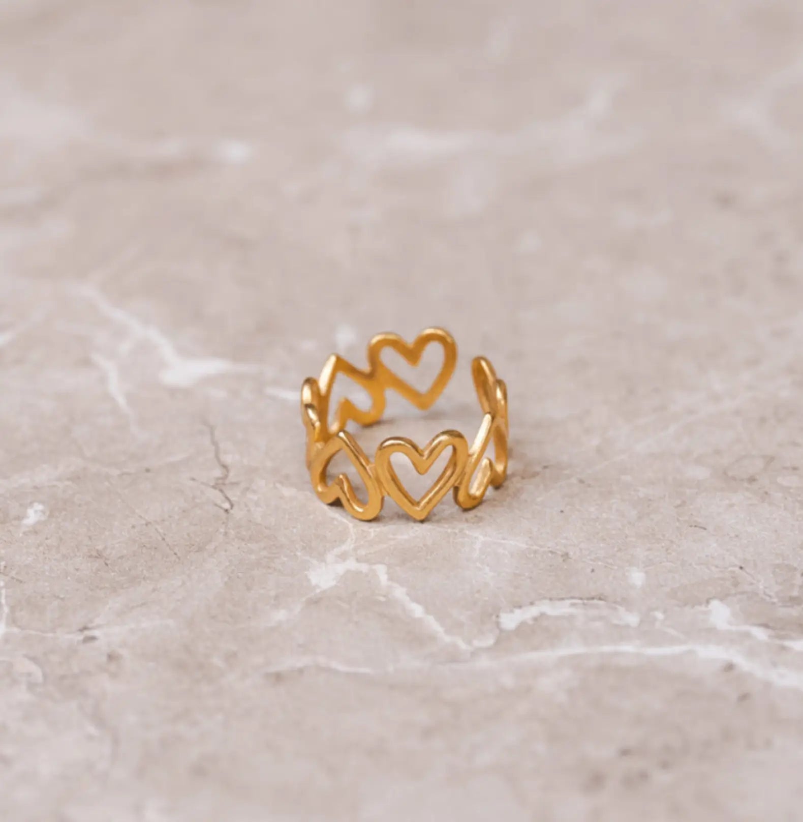 LINKED HEARTS RING
