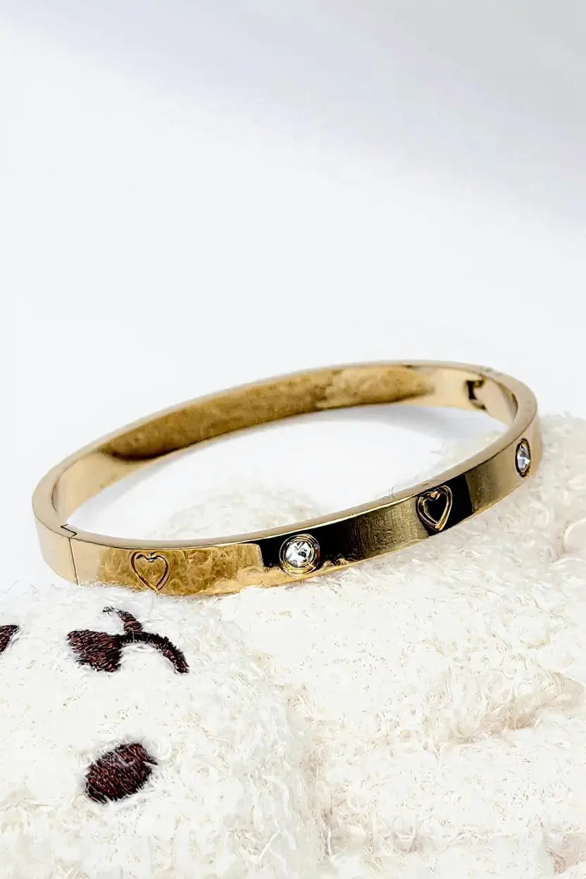 Heart engraved crystal bangle detail close up — YUBAMA 18K gold PVD heart bangle