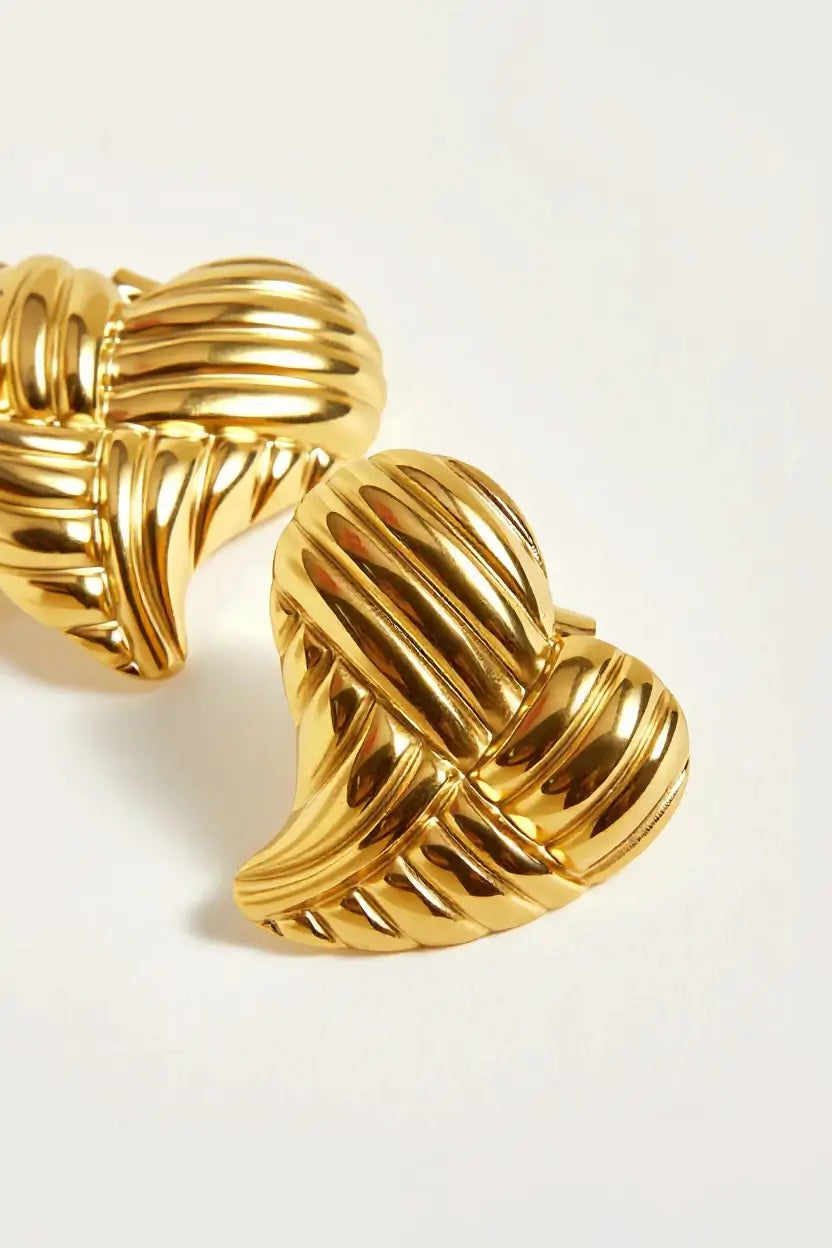 Woven heart stud earrings detail close up — YUBAMA 18K gold PVD sculptural earrings