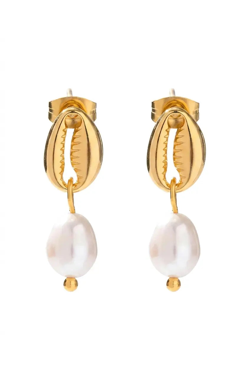A pair of gold drop earrings featuring a textured gold shell-shaped top and a dangling white baroque pearl bead, shown against a plain white background.
