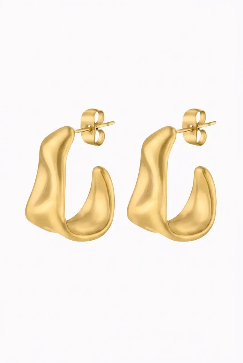 A pair of gold abstract wavy hoop earrings with post-back closures, displayed on a clean white background.