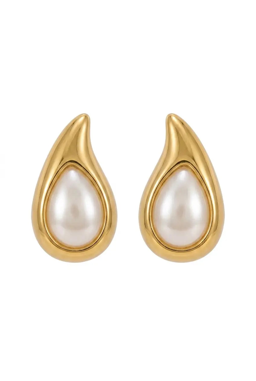 A pair of gold teardrop-shaped earrings with smooth, lustrous white pearl centers, presented on a clean white background.