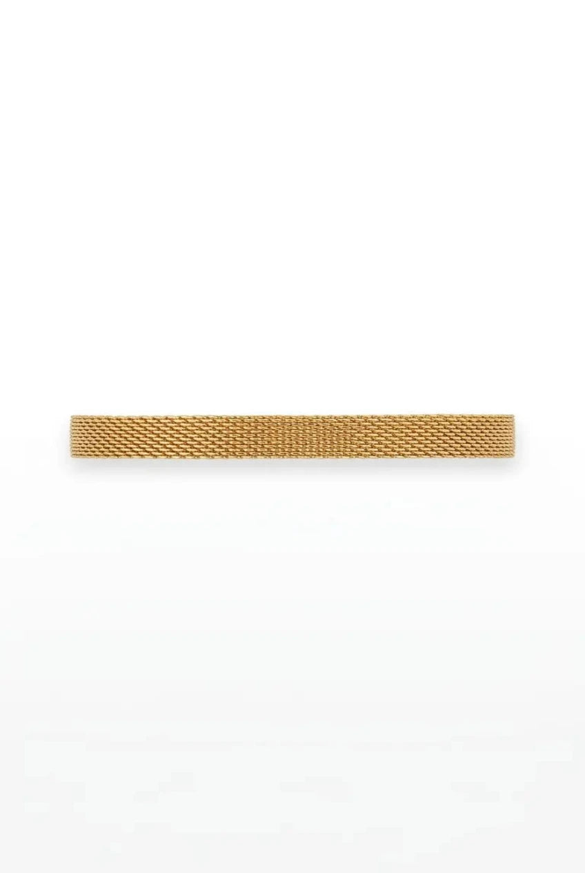 A gold-toned metal mesh tie clip with a fine woven texture, shown horizontally against a plain white background.
