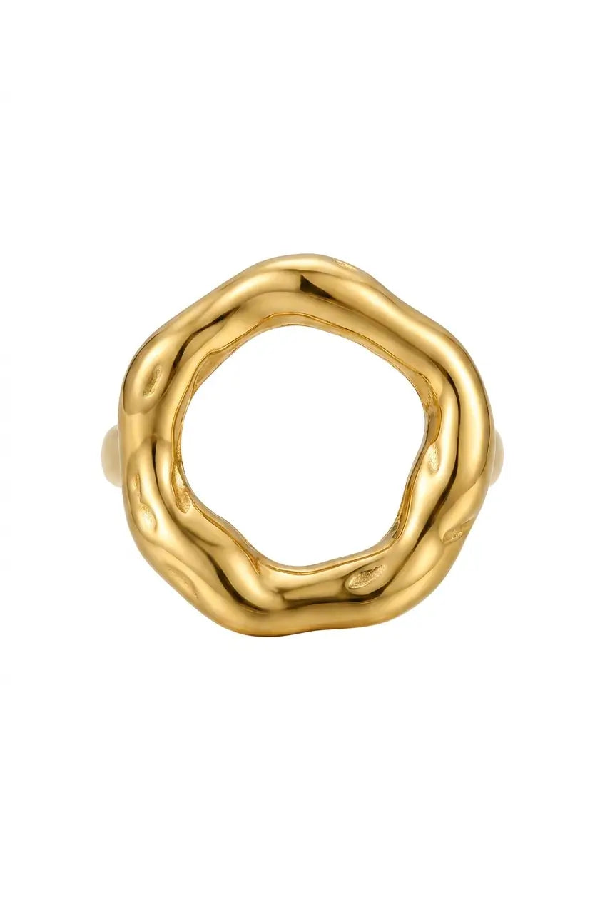 A gold-toned ring with an organic, wavy, open circular design, photographed against a solid white background.