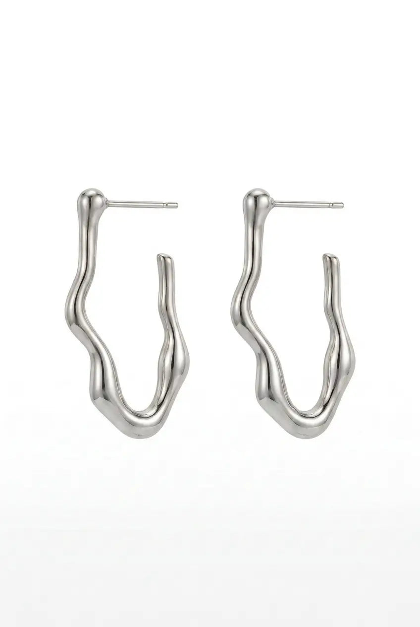 A pair of polished silver-tone wavy hoop earrings with flat posts, displayed on a clean white background.