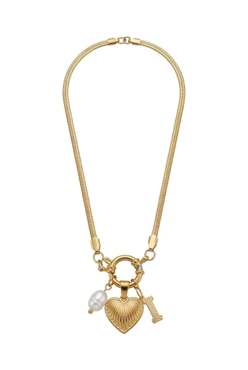 A gold-tone chain necklace featuring a heart-shaped charm with a textured finish, a small white pearl bead, and a small gold boot charm, displayed on a clean white background.