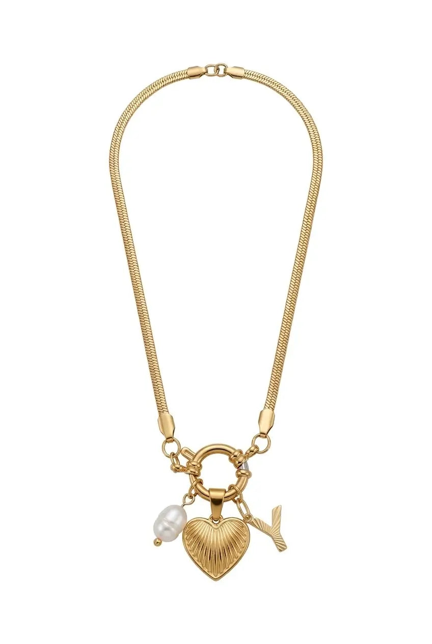 A gold-tone chain necklace featuring a heart-shaped charm with a textured finish, a small white pearl bead, and a gold bird charm, displayed on a clean white background.