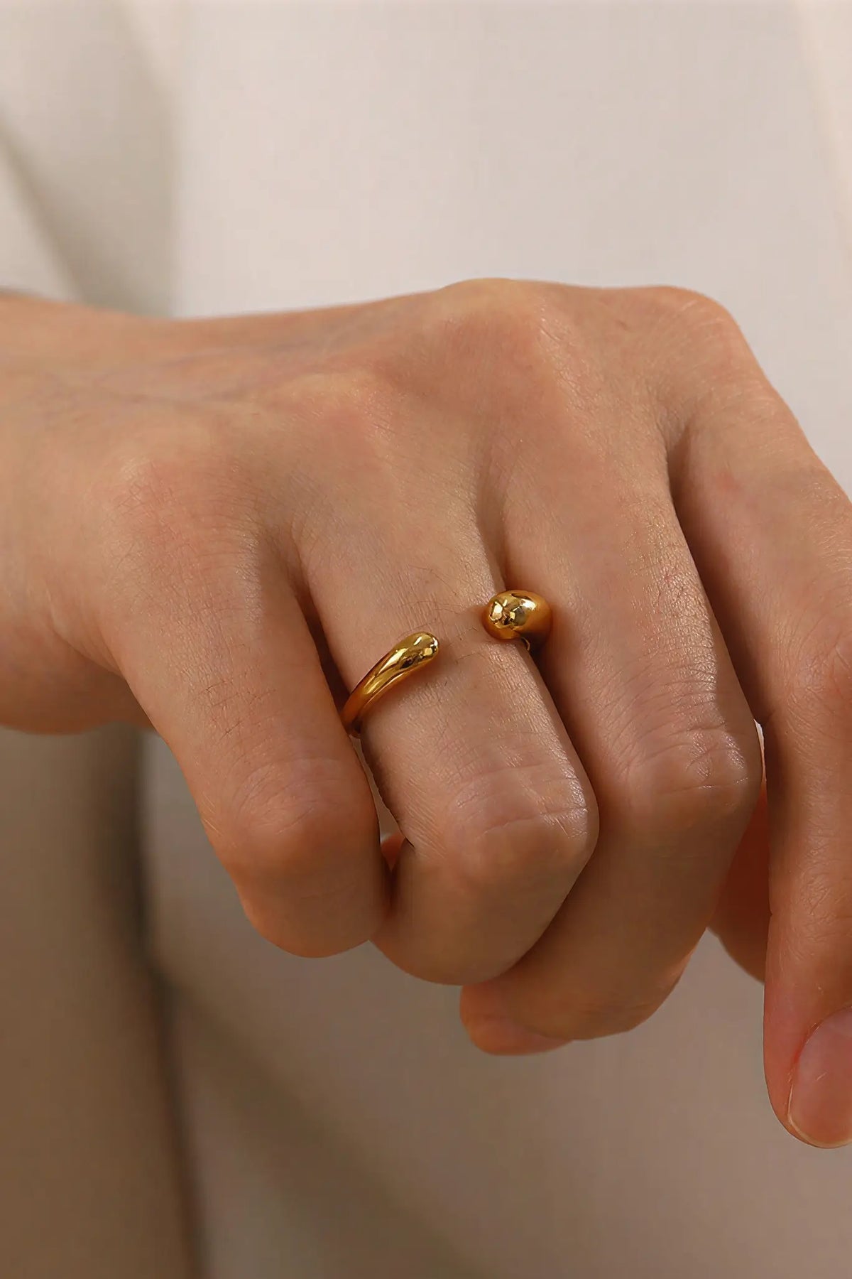 Sphere tip open cuff ring worn on finger — YUBAMA waterproof gold adjustable ring