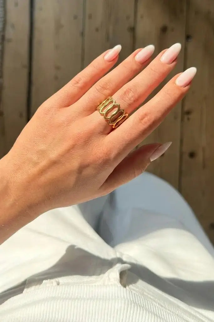 Open oval lattice ring worn on hand — YUBAMA adjustable gold ring
