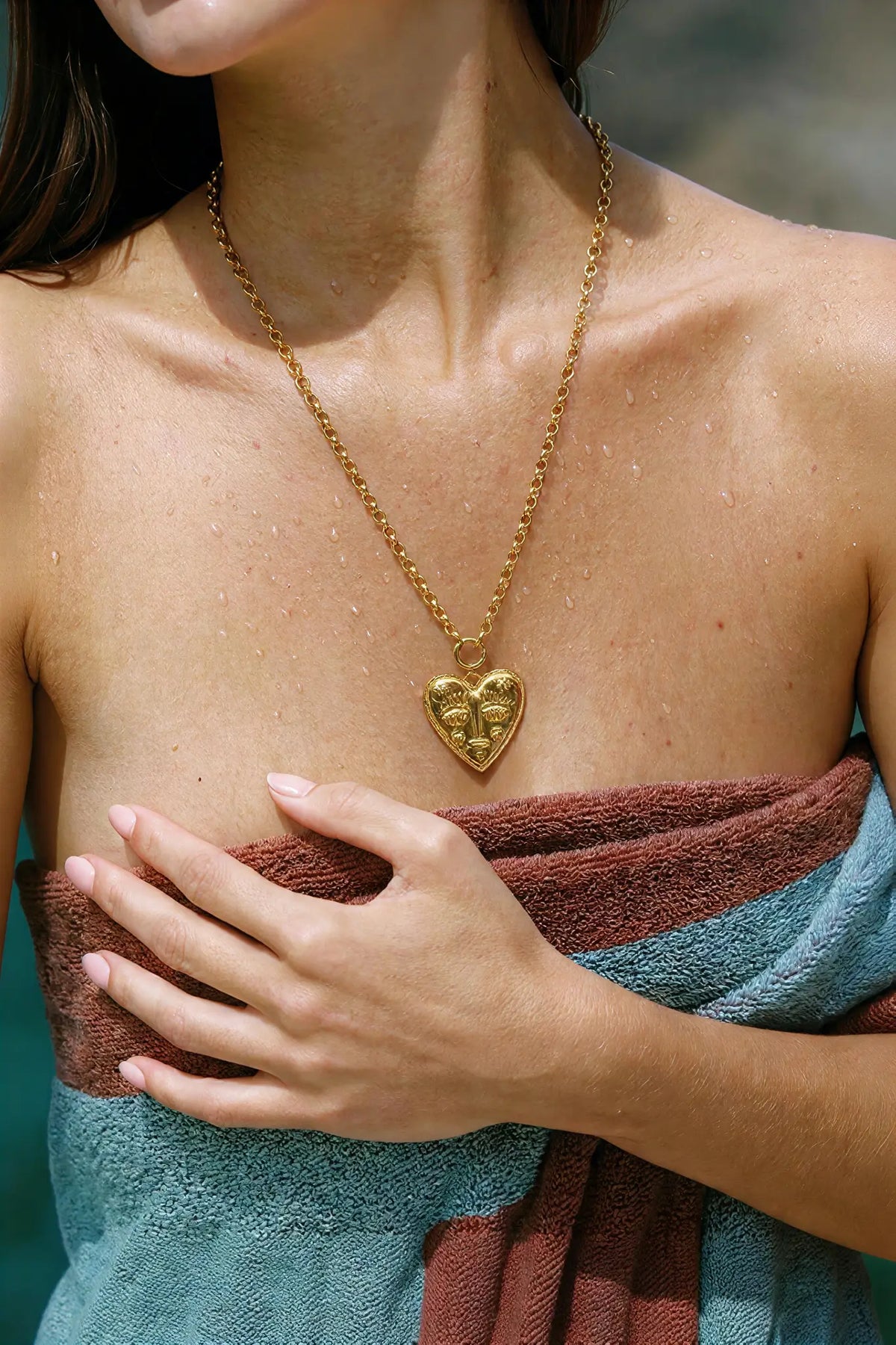 Engraved face heart pendant necklace worn on neck — YUBAMA waterproof gold necklace