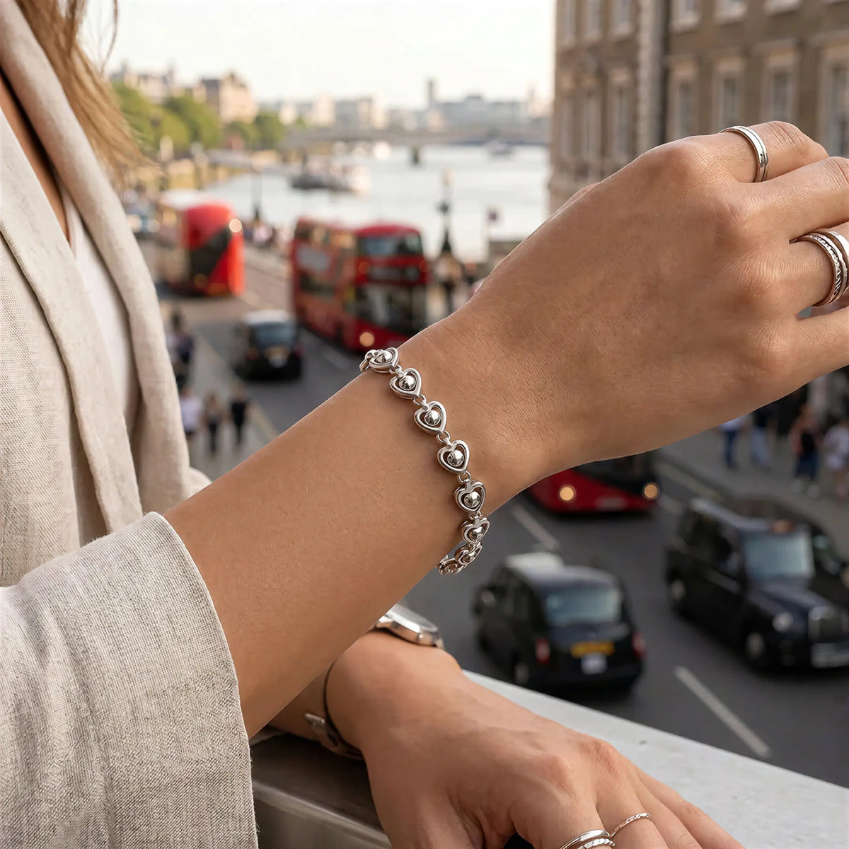 Heart link chain bracelet lifestyle shot — YUBAMA 316L stainless steel heart bracelet