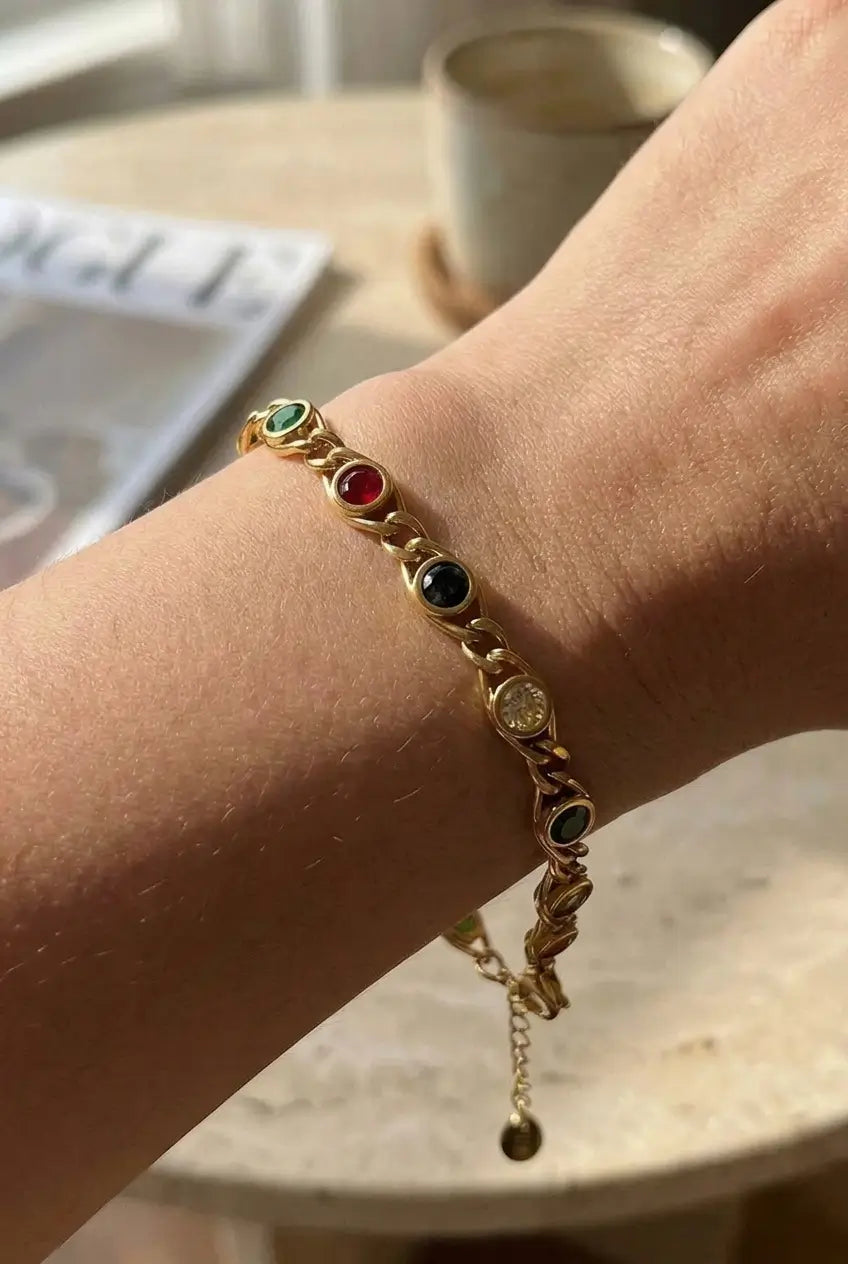 Rainbow crystal chain bracelet worn on wrist — YUBAMA 18K gold PVD waterproof bracelet