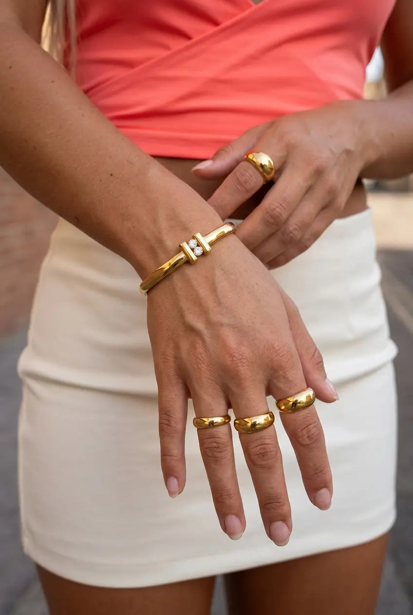 Double bar crystal bangle worn on wrist stacked — YUBAMA waterproof gold bangle