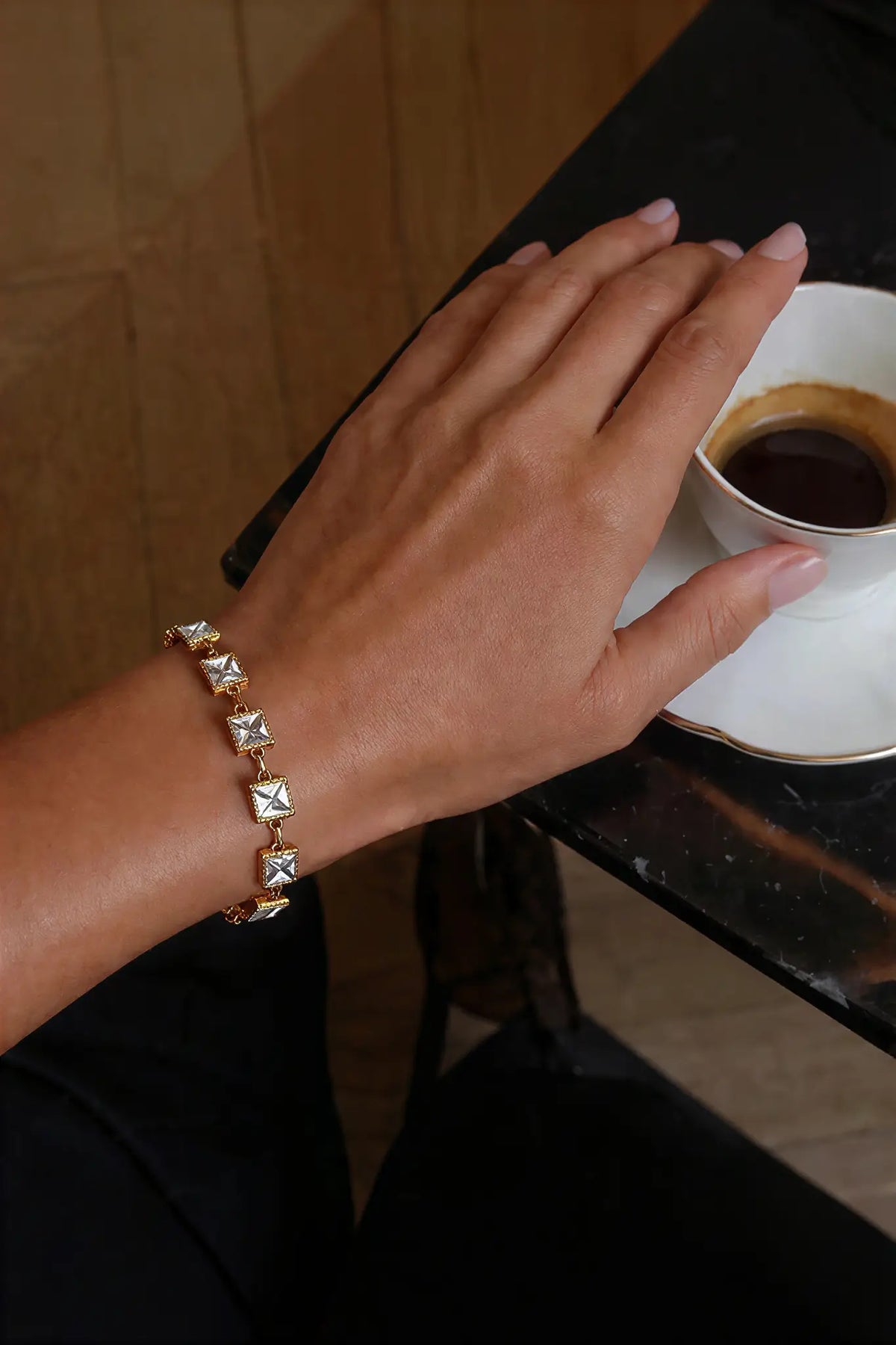 Princess cut crystal bracelet worn on wrist — YUBAMA waterproof gold crystal bracelet