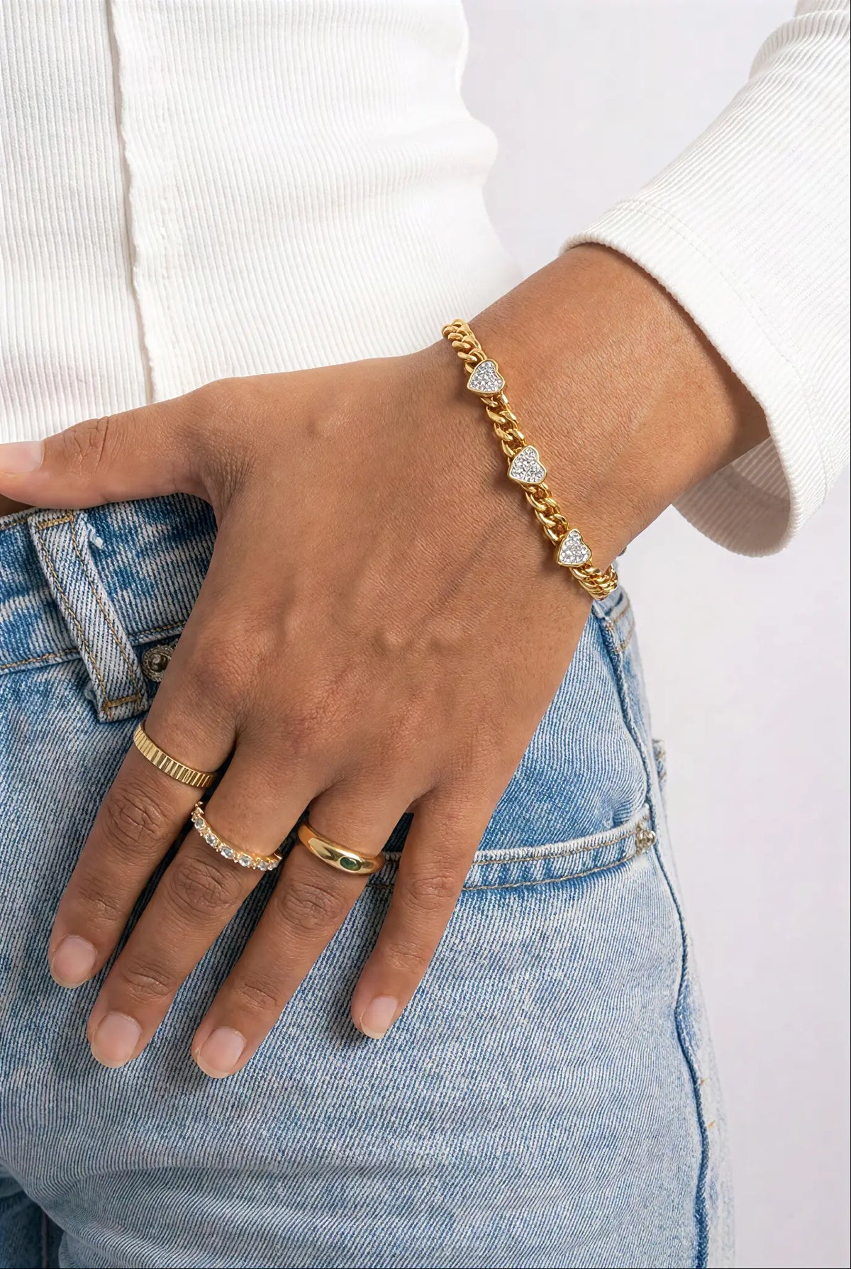Crystal heart Cuban bracelet worn on wrist — YUBAMA 18K gold PVD waterproof bracelet