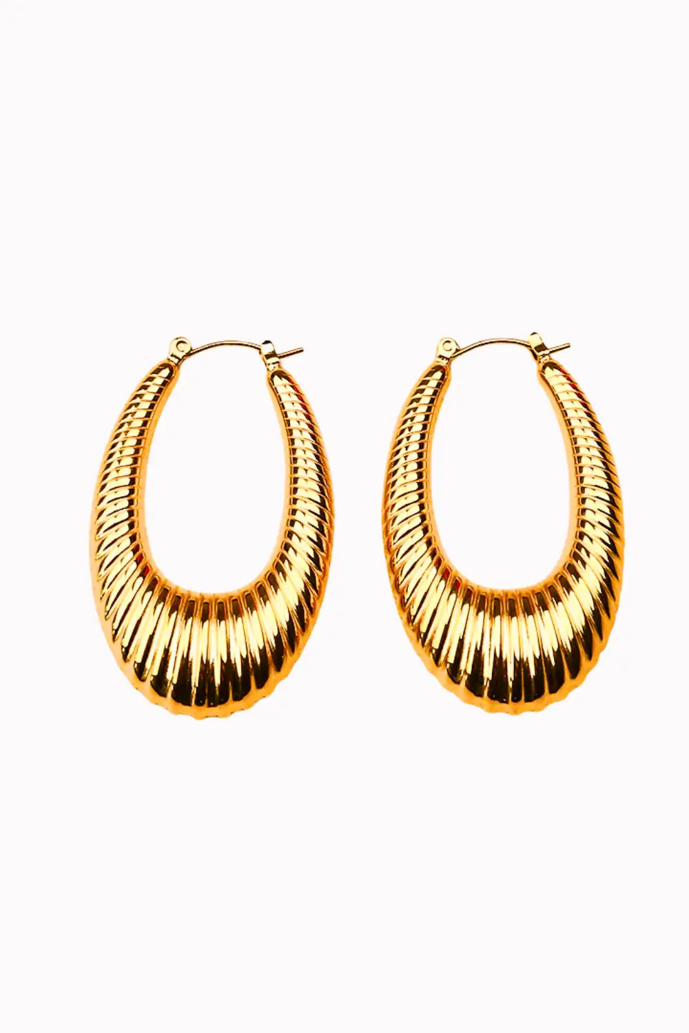 A pair of gold-toned textured hoop earrings with a ribbed, fluted surface, displayed on a clean white background.