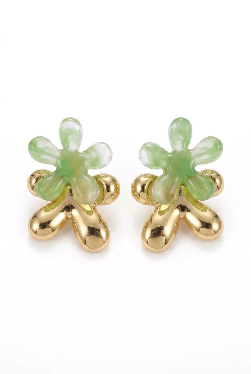 A pair of gold and light green flower-shaped stud earrings on a plain white background.