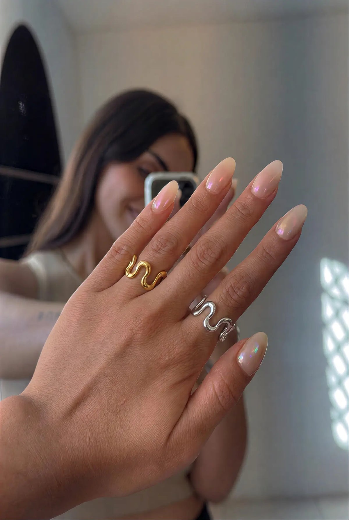 Fluid wave ring worn on finger — YUBAMA 18K gold PVD waterproof ring